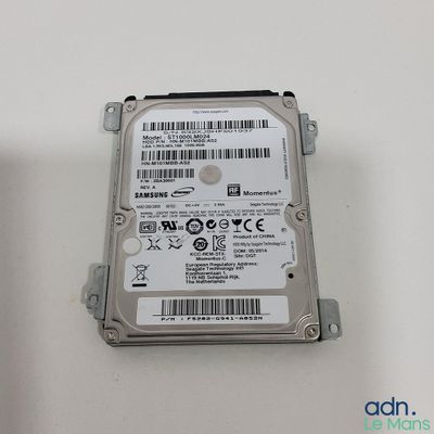 an image of a hard drive sitting on top of a white table