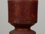 a wooden box with a lid sitting on a table
