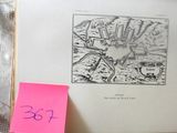 a picture of a book with a pink post - it note on it