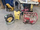 many different types of tools that are sitting on the floor