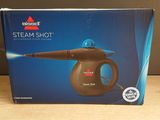 the box of the steam shot is open on the table