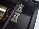 a music box with a musical instrument inside of it