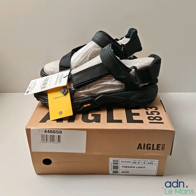 a box with a pair of shoes on top of it