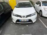 two cars parked in a parking lot next to each other