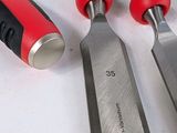 five different types of kitchen knives on a table