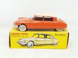 a small toy car sitting on top of a box