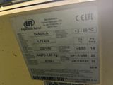 a label on the back of a machine that is sitting on a table