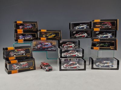 many different models of cars in a display case