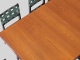 a wooden table with six chairs around it