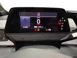 the dashboard of a car with a digital display on it