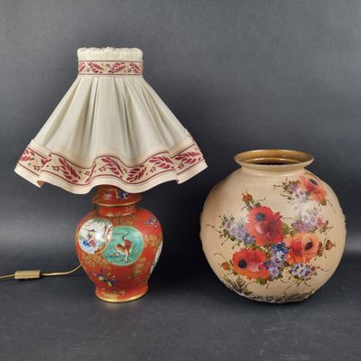 two vases and a lamp on a table with a lamp shade