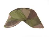 a green and brown hat on a white surface