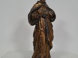 statue of a woman holding a baby in her arms
