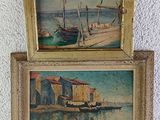 two paintings of boats are on display in a gold frame