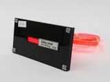an image of a red and black object on a white surface