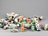 a pile of toys that are sitting on a table