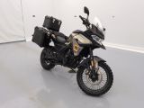 a picture of a motorcycle parked inside of a building