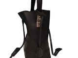 the small black bag has a zipper on the front and a metal handle