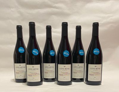 six bottles of wine are lined up in a row on a white background