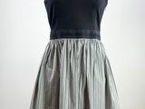a picture of a dress on a mannequin stand