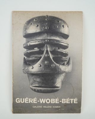 an old photo of a book with a helmet on it