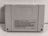 a close up of a nintendo game console sitting on top of a table