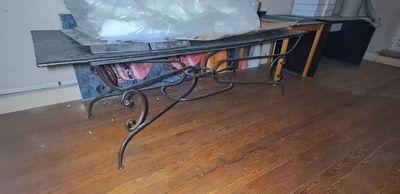 a table that has a bunch of bags on top of it