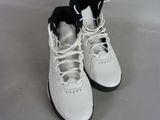 a pair of white shoes with black laces on them