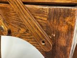 a wooden table with a drawer on top of it
