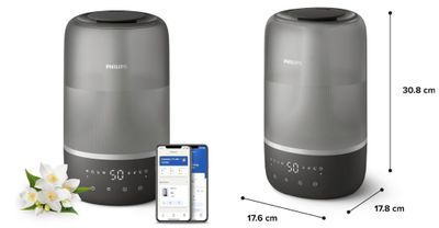 an image of a picture of a smart speaker with a phone next to it