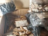 a box full of nuts and other items on a table