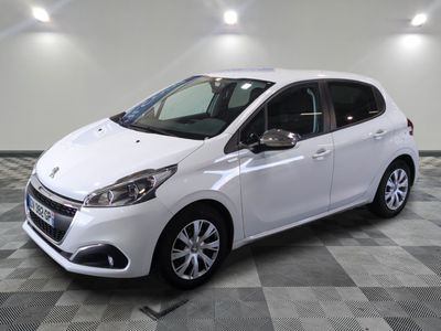 the white car is parked on a checkered tile floor