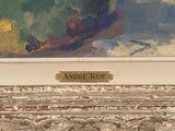 a painting on the wall of a building that has a plaque on it