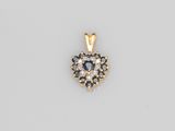 a sapphire and diamond cluster pendant
