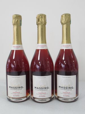 three bottles of wine sitting on top of a table next to each other