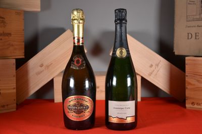two bottles of wine sitting next to each other on a table