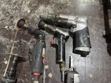 a lot of tools that are laying out on the floor