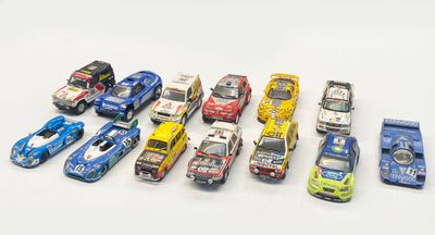 a lot of toy cars that are lined up together