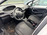 a car with a steering wheel and a dash board