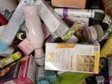 many different types of skin care products in a bin