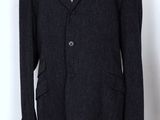 a black suit with a white shirt and tie on a mannequin mannequin mannequin mann