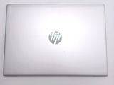 a laptop that is sitting on a white table