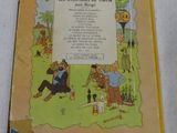 an old children ' s book with a picture of a man and a woman sitting on a bench