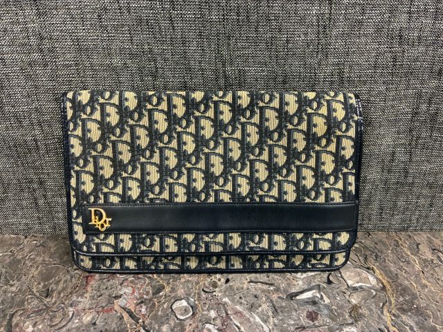 CHRISTIAN DIOR - Pochette en tissu monogrammée bleu nuit, fermetu...