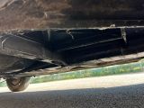 a close up view of a car ' s exhaust pipe