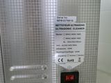 a close up of a metal box with a label on it