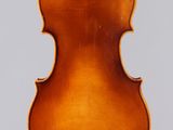 an old violin with a wooden back and bow on a white background