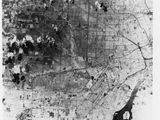 une vieille photo en noir et blanc représentant une carte d'une ville