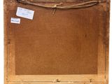 an old wooden frame with a tag attached to it