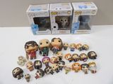 a lot of harry potter figurines on the table